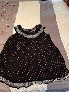 Axcess Black Sleeveless Ruffle Neck Tank with White Cross Pattern